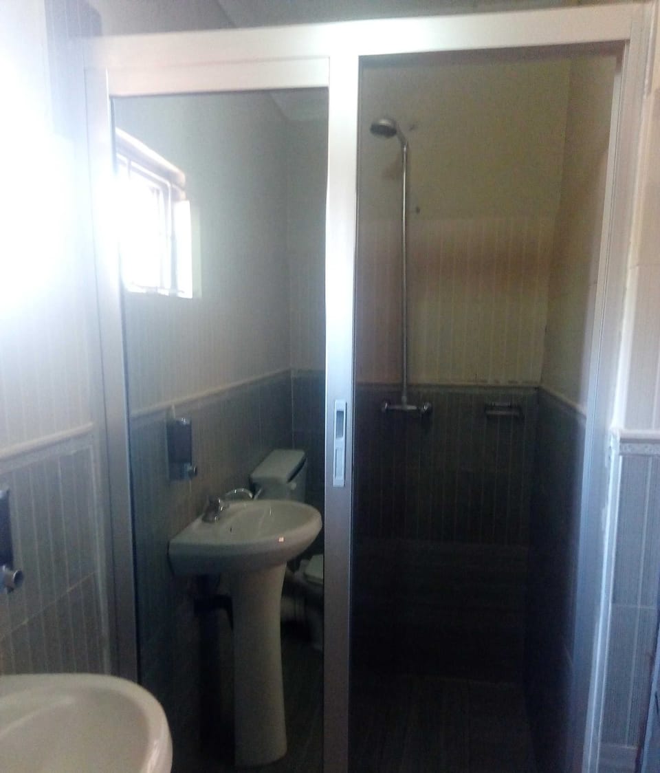 Shower, towels, soap, shampoo