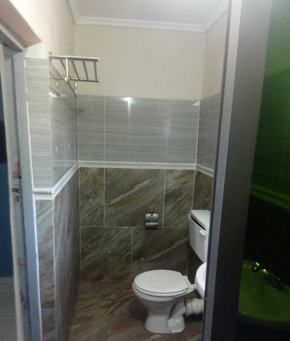 Standard Room | Bathroom | Shower, towels, soap, shampoo