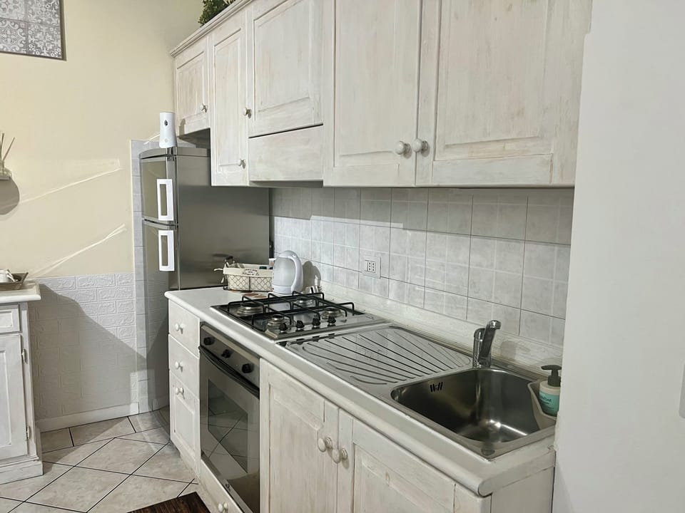 Classic Condo | Private kitchen | Espresso maker, coffee/tea maker, electric kettle