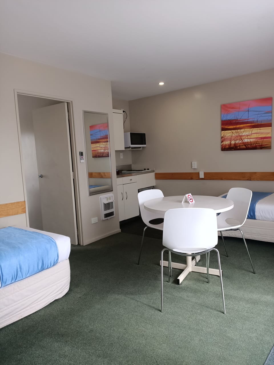 6. Family One Bedroom | Living area | 32-inch flat-screen TV with cable channels, TV