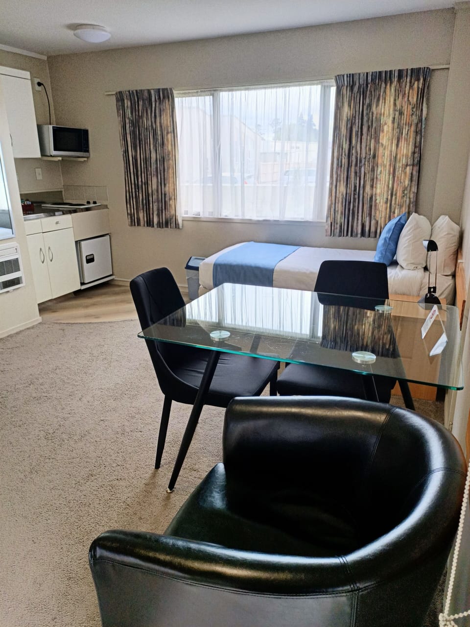 14. Deluxe One Bedroom | Living area | 32-inch flat-screen TV with cable channels, TV