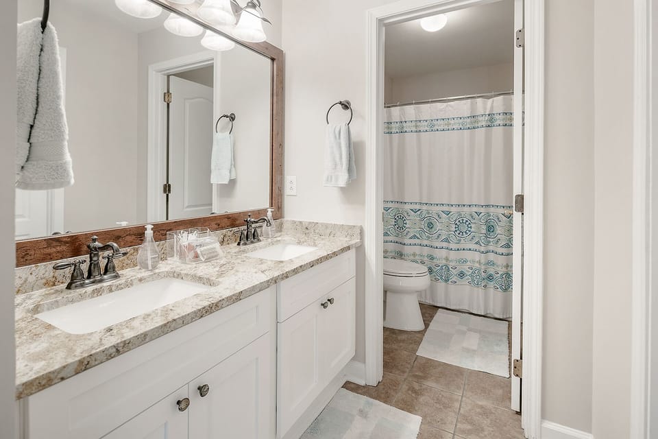 Master Bath with Granite Countertop and Double Sink