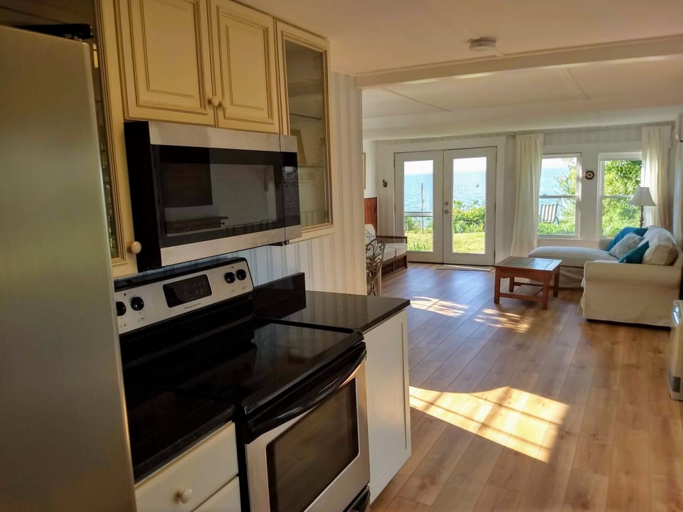 Kitchen and living room. (Dining room table is around the corner to the left)