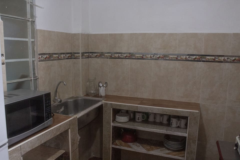 Traditional Room | Private kitchen | Fridge, microwave, stovetop, cookware/dishes/utensils