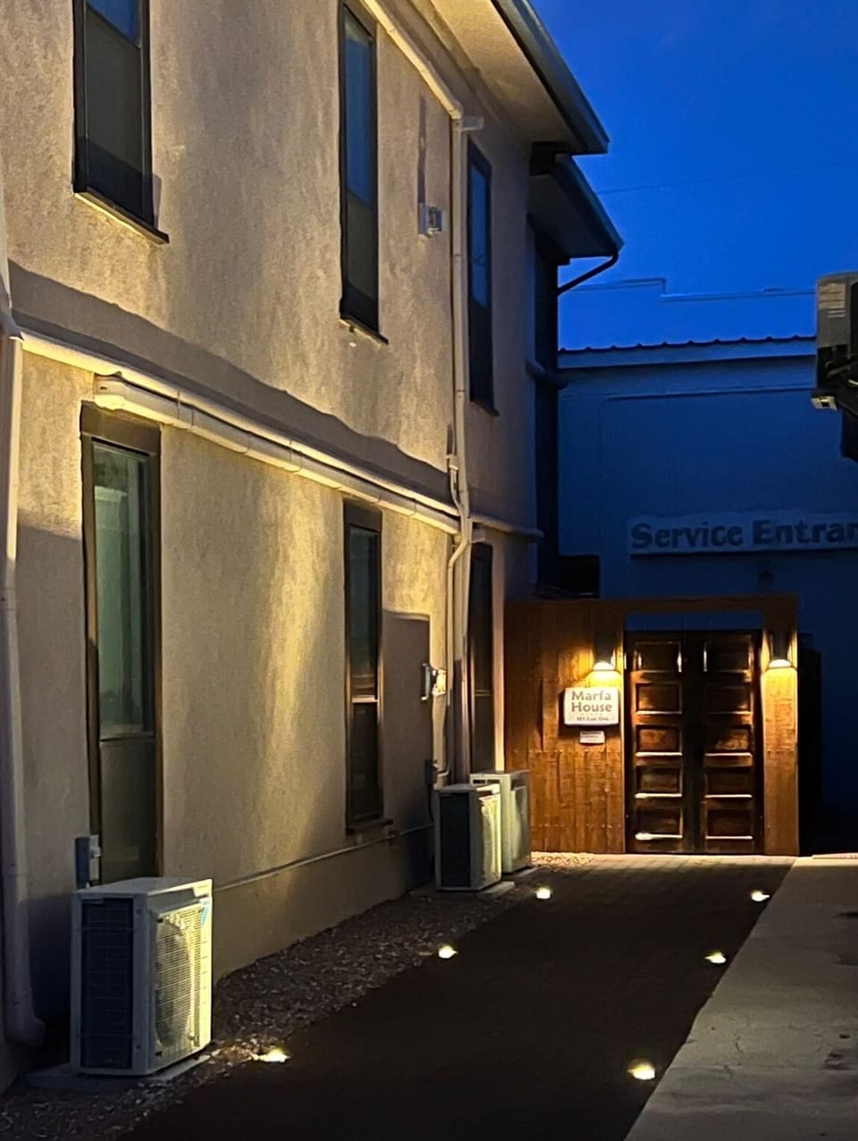 Lighted entry walkway at Marfa House