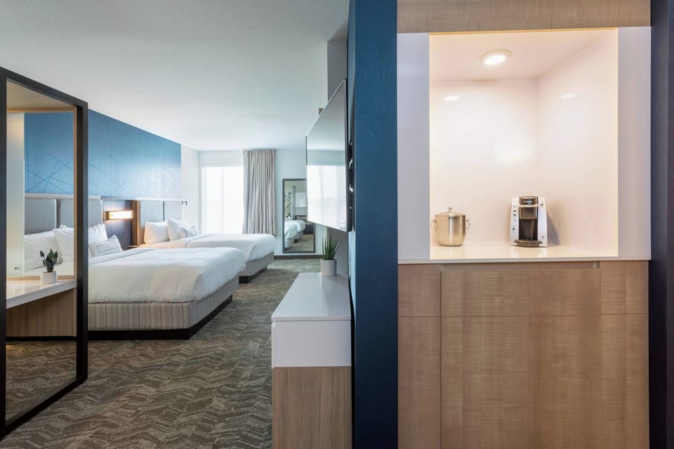 Desk, laptop workspace, blackout drapes, iron/ironing board