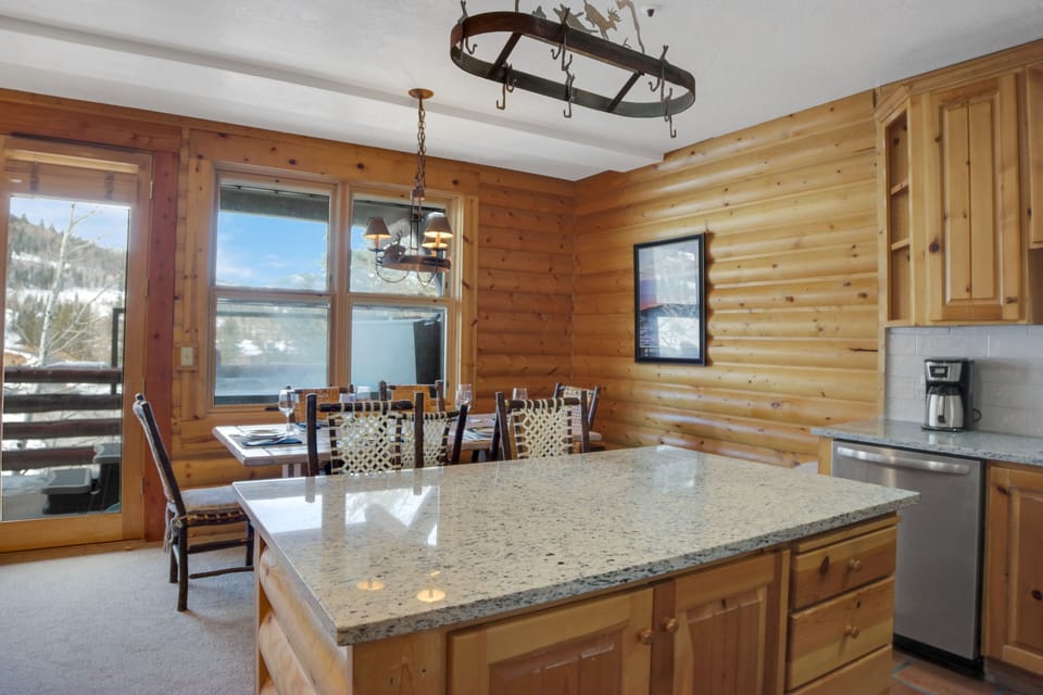 The open concept kitchen and dining area.