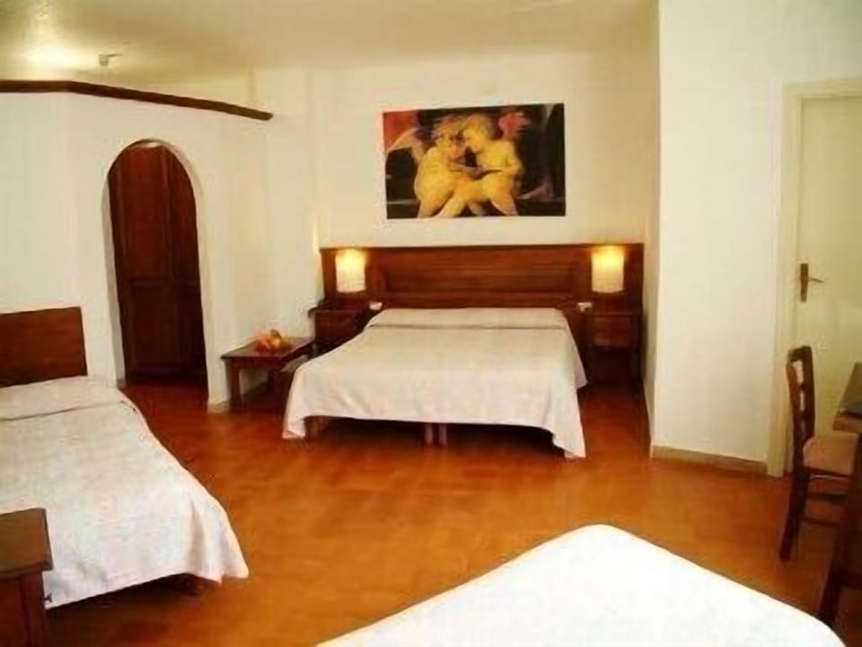 Quadruple Room | Minibar, in-room safe, cribs/infant beds, free WiFi