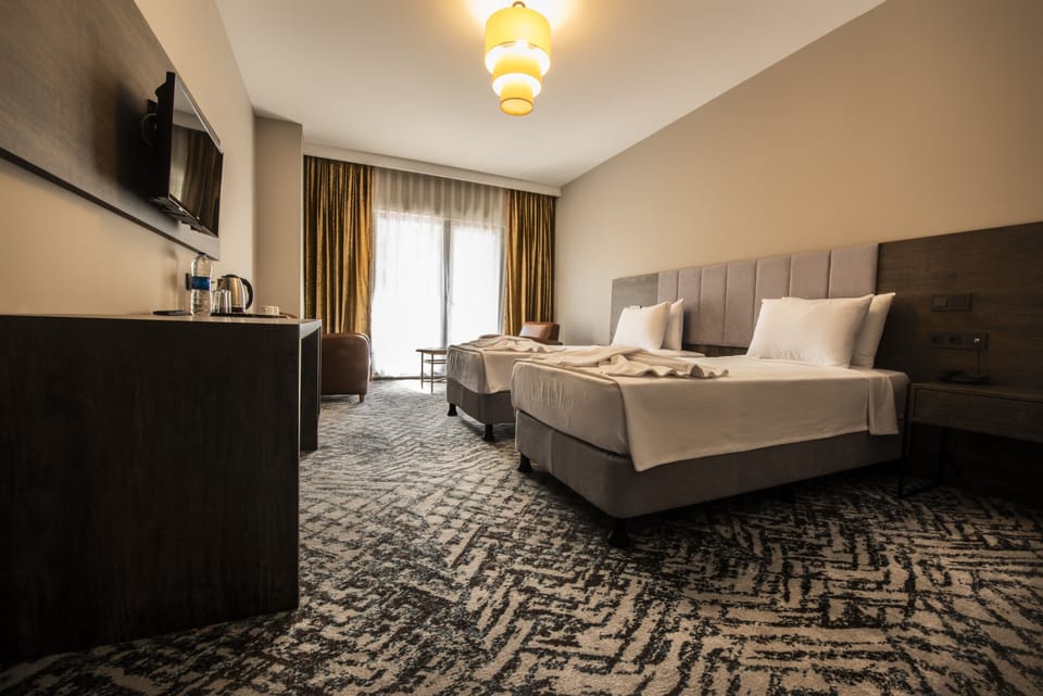 Standard Room | Egyptian cotton sheets, premium bedding, minibar, blackout drapes