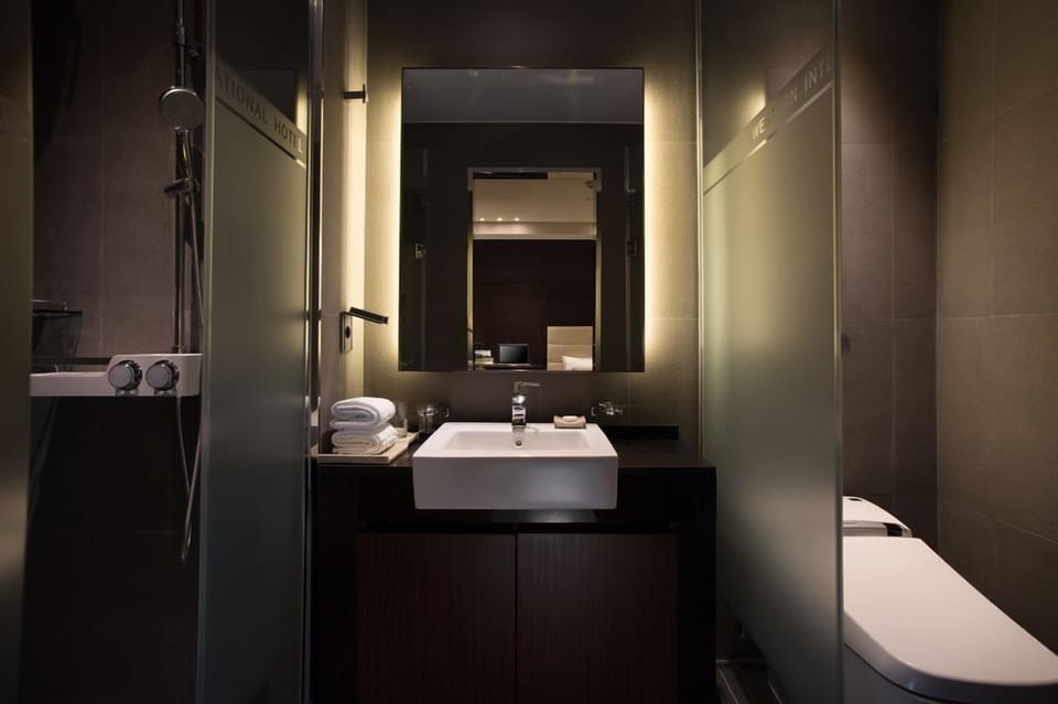 Shower, hair dryer, slippers, heated floors