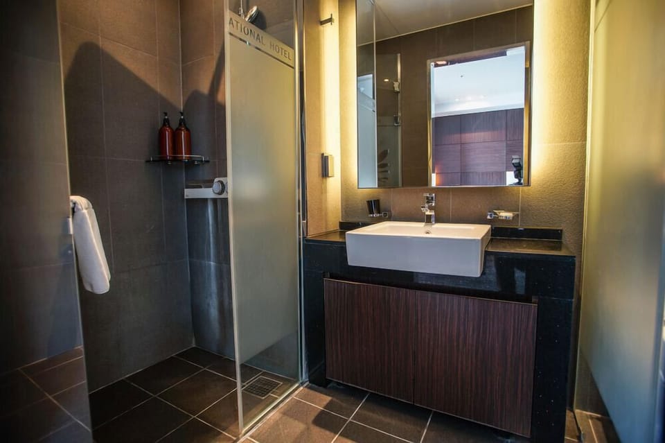 Shower, hair dryer, slippers, heated floors