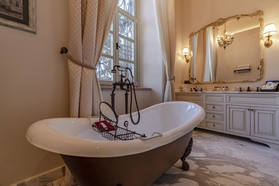 Premium Suite, 1 Queen Bed, Sea View | Premium bedding, in-room safe, laptop workspace, blackout drapes