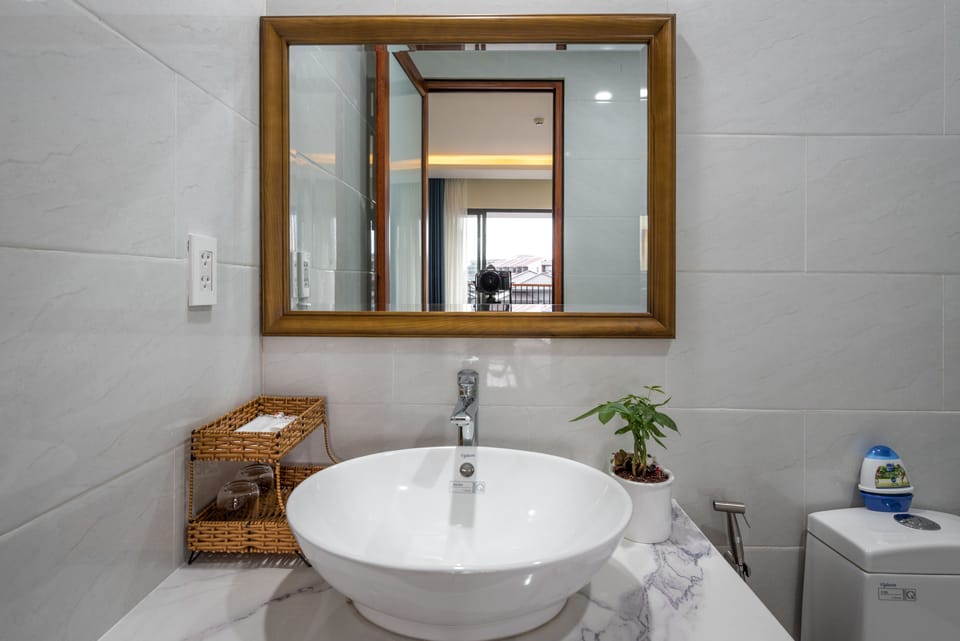 Shower, free toiletries, hair dryer, slippers