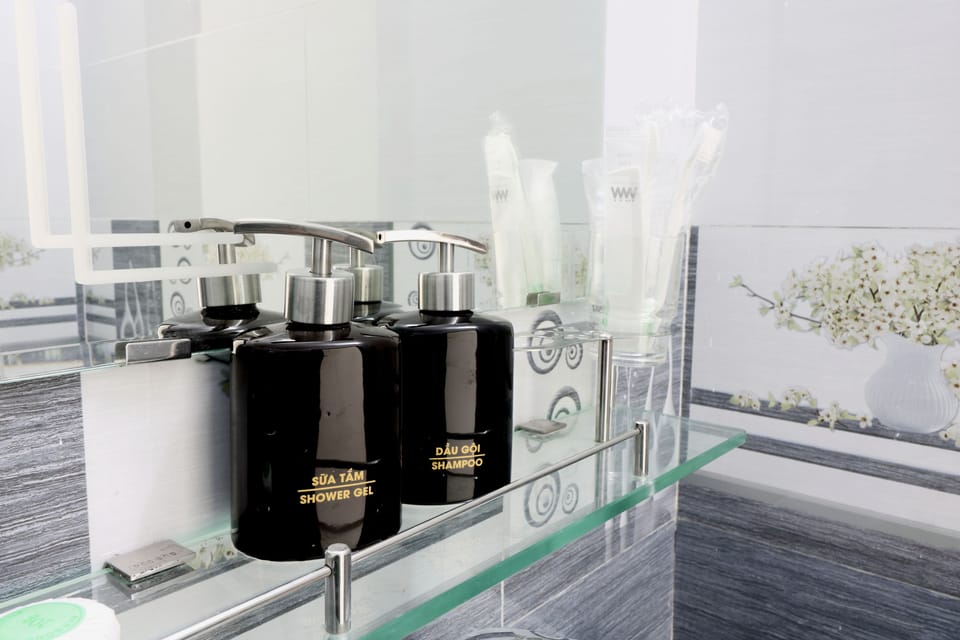 Deluxe Double Room, City View | Bathroom amenities | Shower, rainfall showerhead, free toiletries, hair dryer