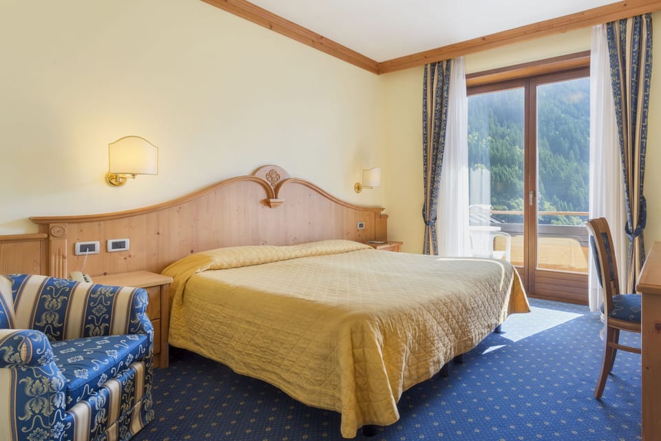 Double or Twin Room, Balcony (Dolomiti) | In-room safe, free WiFi, bed sheets