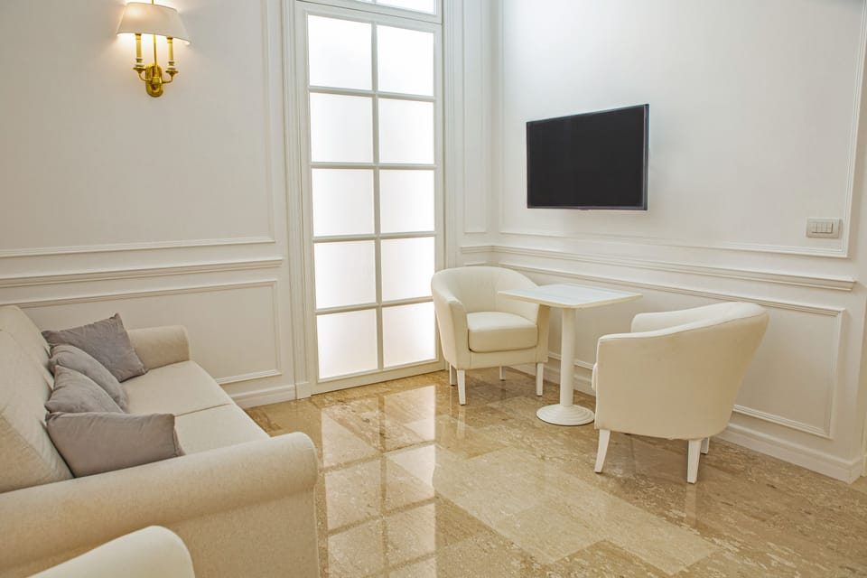 Junior Suite | Living room | Flat-screen TV