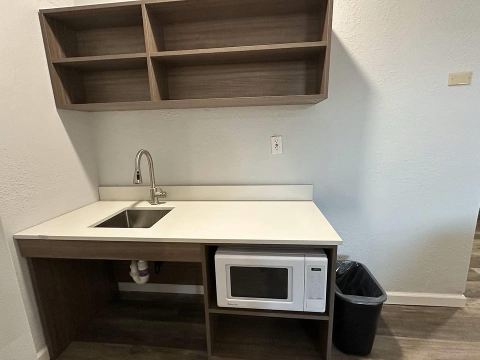 Full-size fridge, microwave, stovetop