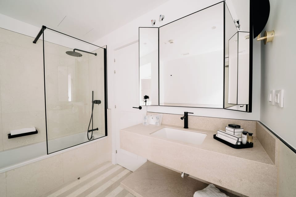 Double or Twin Room | Bathroom | Combined shower/tub, hair dryer, towels, soap