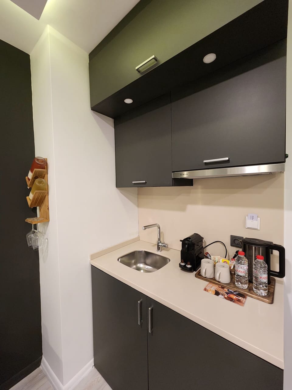 Mini-fridge, electric kettle, cookware/dishes/utensils