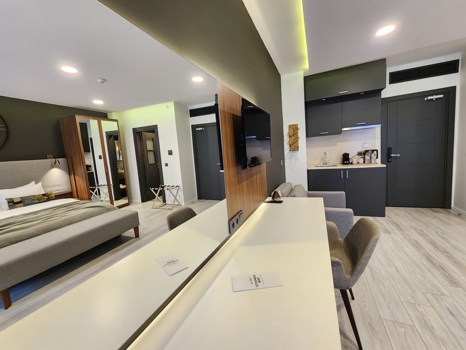 Premium bedding, down comforters, pillowtop beds, minibar