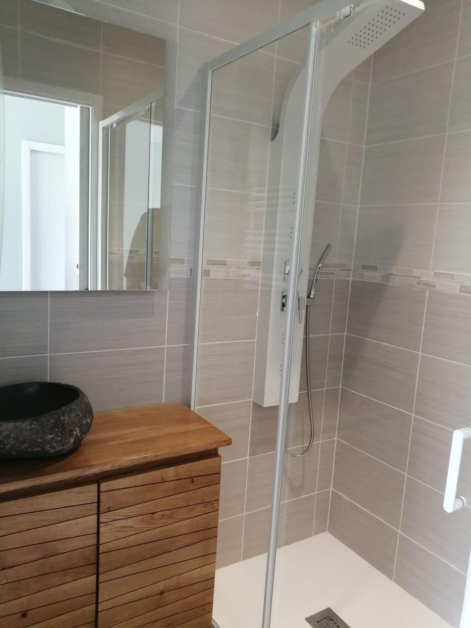 Shower, hydromassage showerhead, designer toiletries, hair dryer