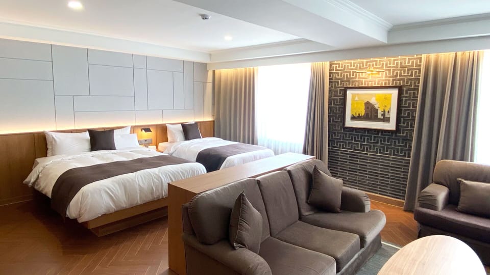 Premium bedding, free minibar items, in-room safe, desk