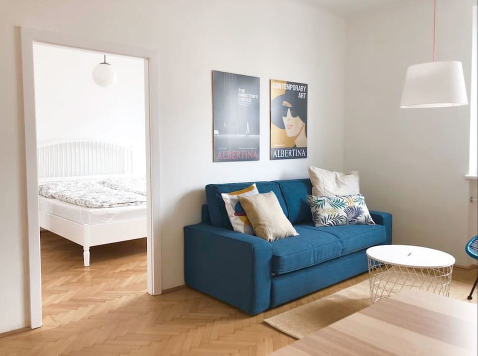Apartment Top 6 (incl. EUR69 Cleaning, Towel + Linen Fee) | Living room | Flat-screen TV