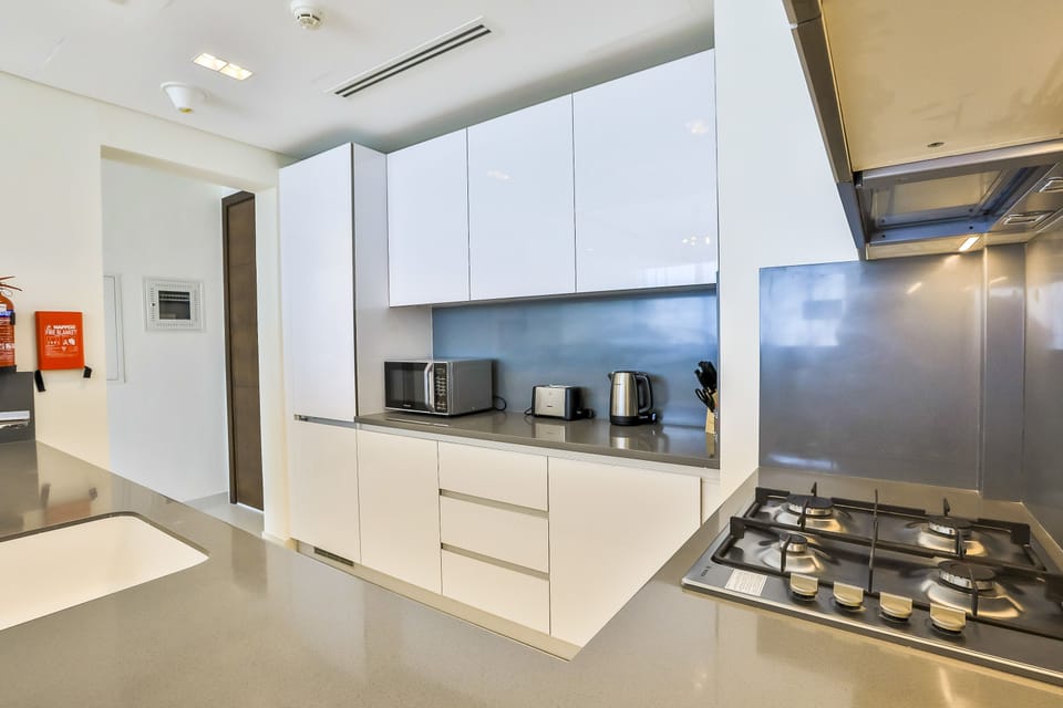 DHH - 2 Beds For The Price of 1 Bed Mada Residences Downtown | Shared kitchen