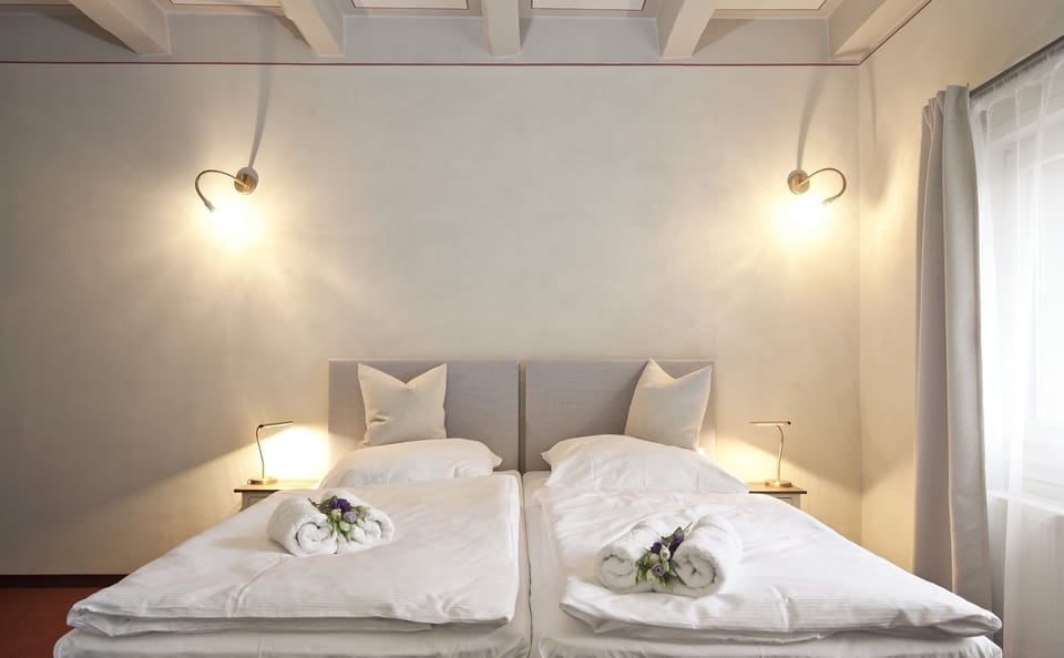 Comfort Twin Room | Select Comfort beds, in-room safe, desk, blackout drapes