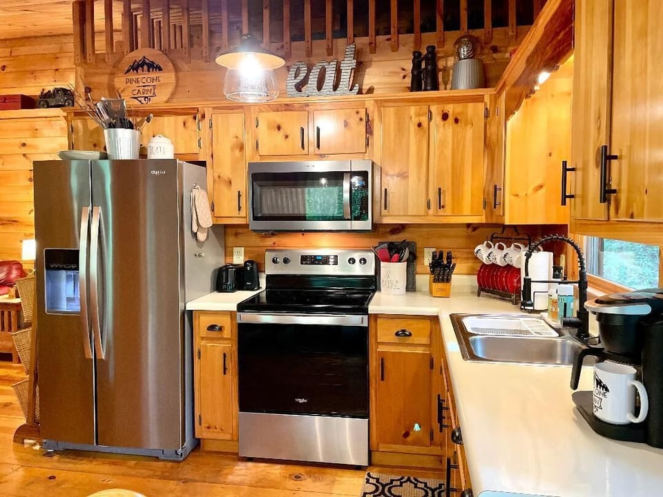Stainless steal appliances and a well appointed kitchen to cook meals