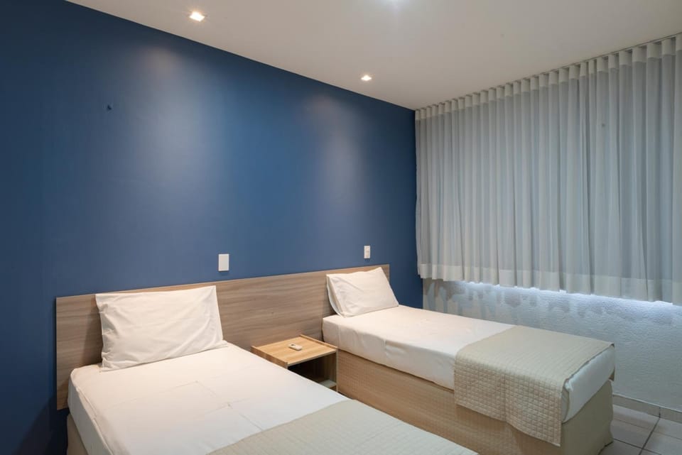 Desk, blackout drapes, free WiFi, bed sheets