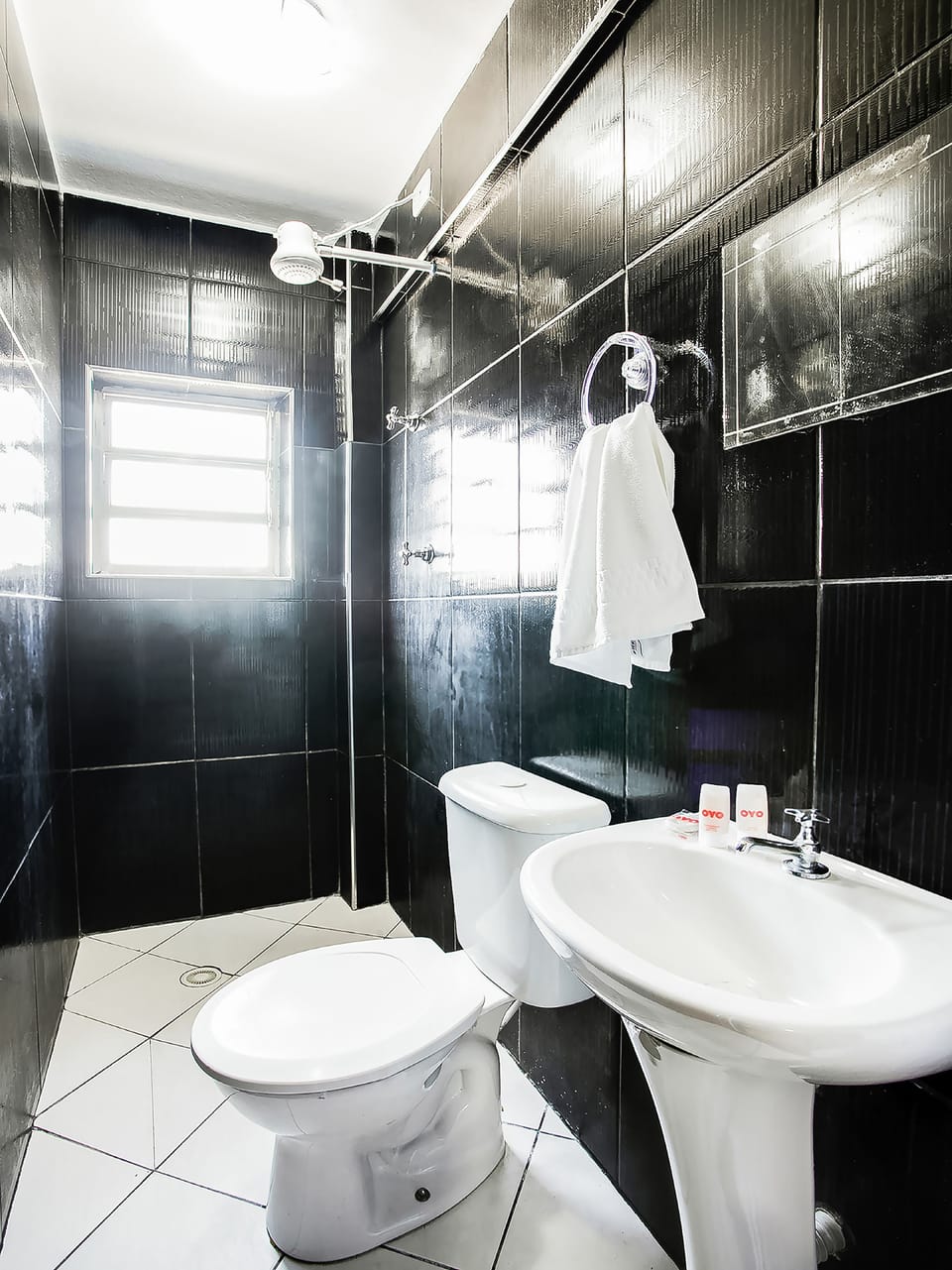 Quadruple Room (1 Double bed + 2 Single beds) | Bathroom | Shower, towels, soap, shampoo