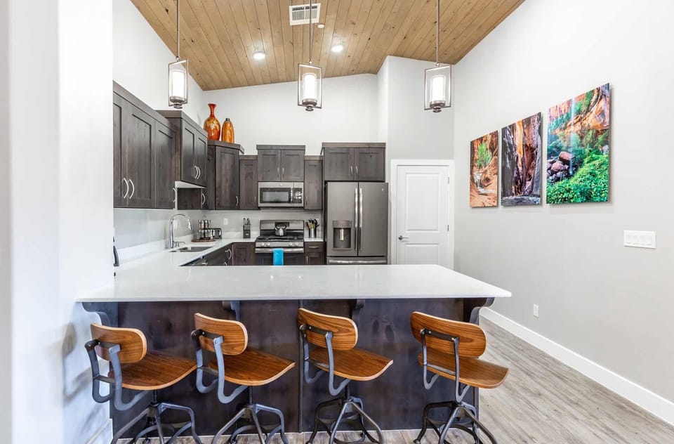 Condo, 4 Bedrooms | Private kitchen | Fridge, microwave, oven, coffee/tea maker