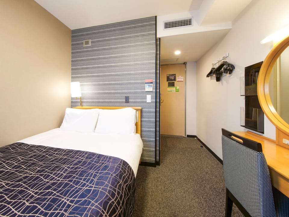 Desk, blackout drapes, WiFi (free), bed sheets
