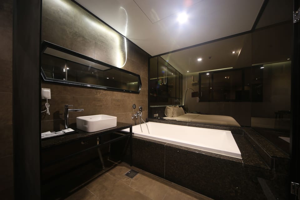 Premium Studio | Bathroom | Free toiletries, hair dryer, bathrobes, slippers