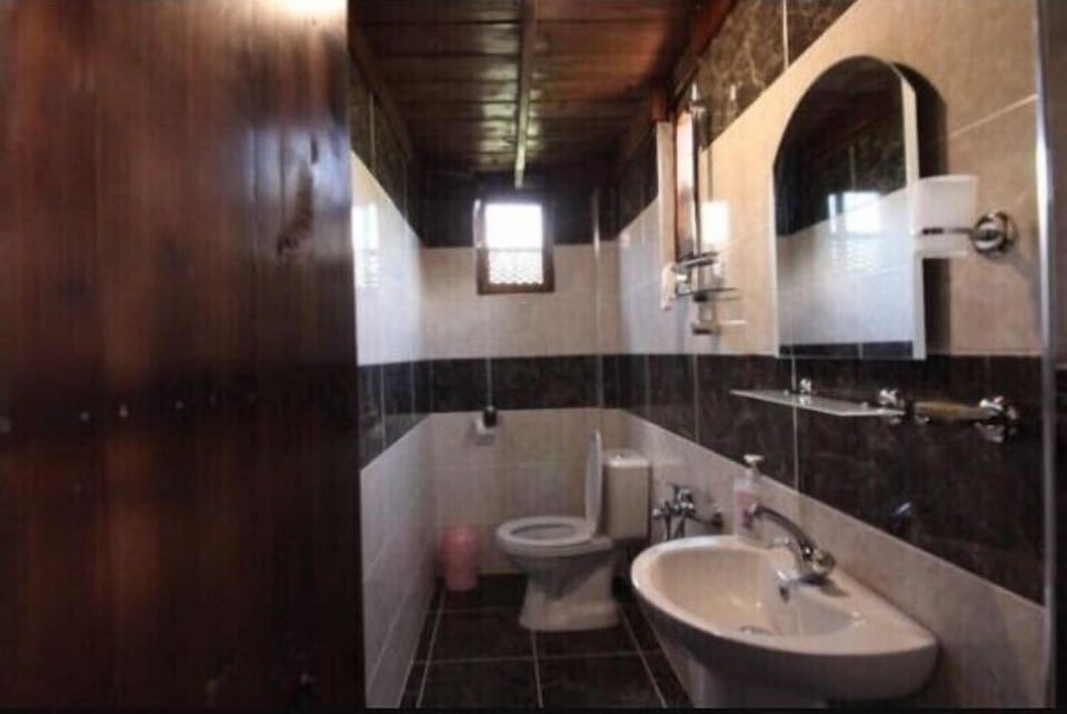 Shower, free toiletries, hair dryer, slippers