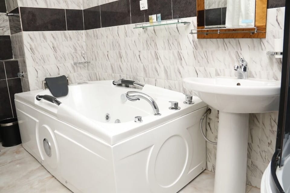 Shower, towels, soap, shampoo