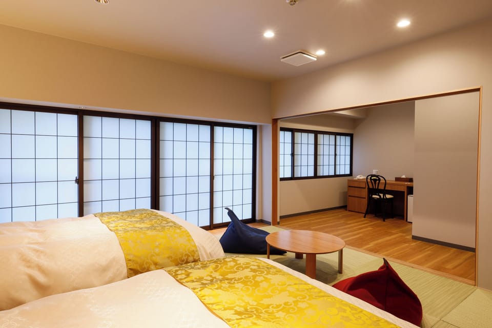Japanese-style Twin Room, Non Smoking, Annex Building | Down comforters, in-room safe, desk, WiFi (free)