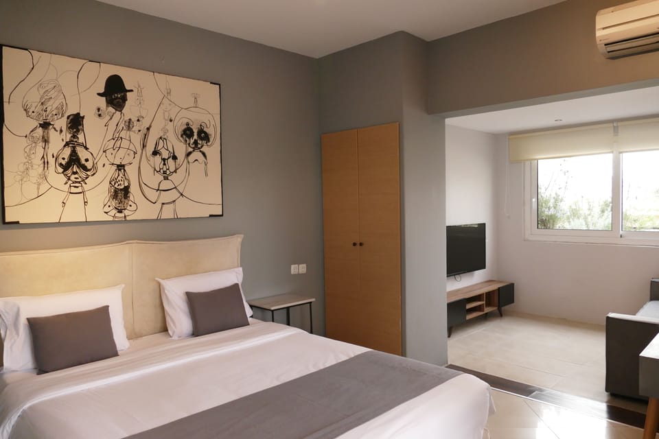 Family Room, Acropolis View | In-room safe, blackout drapes, iron/ironing board, free WiFi