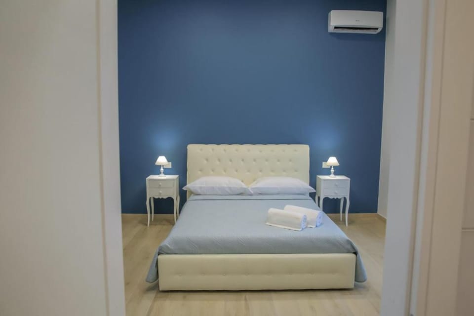 Deluxe Quadruple Room | Individually decorated, individually furnished, desk, laptop workspace