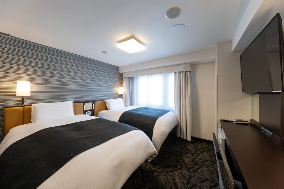 Premium bedding, down comforters, desk, blackout drapes