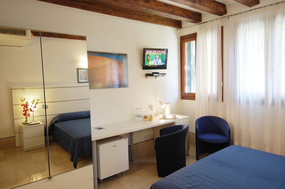Double or Twin Room | 1 bedroom, minibar, in-room safe, desk