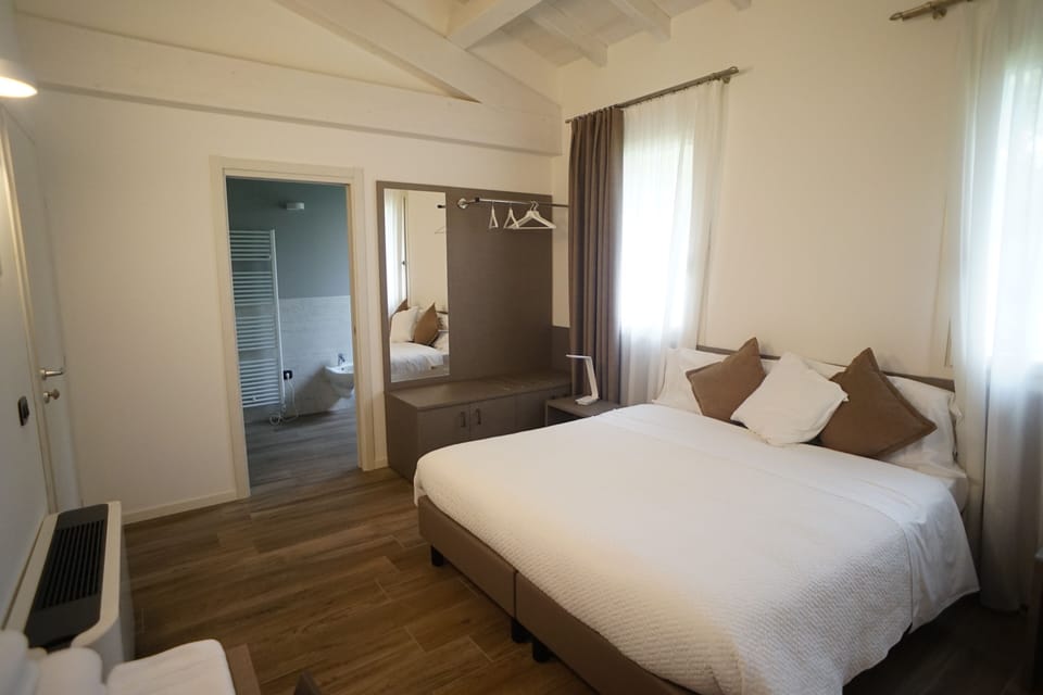 Double or Twin Room | In-room safe, cribs (surcharge), WiFi (free), bed sheets
