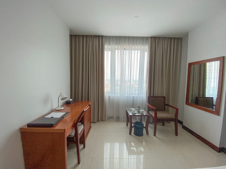 Superior Room | Minibar, desk, laptop workspace, blackout drapes