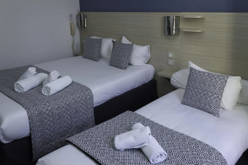 Desk, laptop workspace, blackout drapes, soundproofing