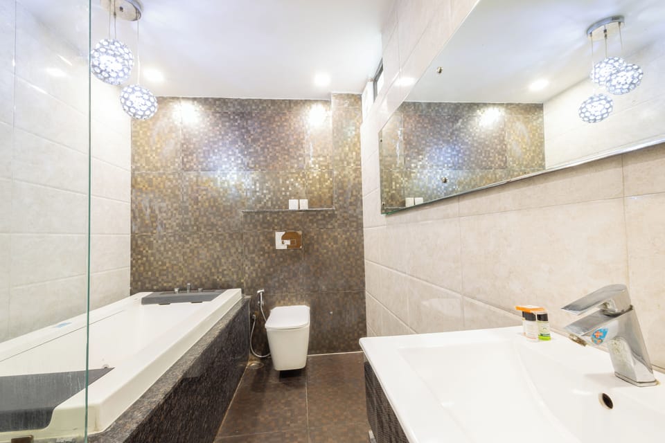 Superior Studio Suite | Bathroom | Eco-friendly toiletries, hair dryer, slippers, bidet
