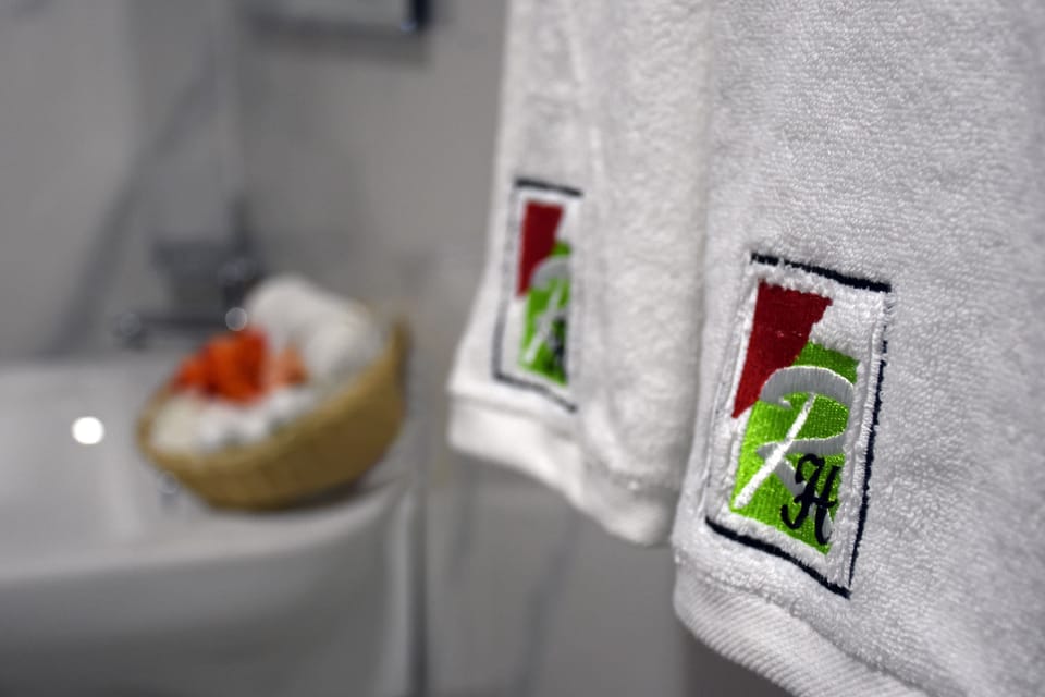 Family Room | Bathroom | Shower, slippers, towels