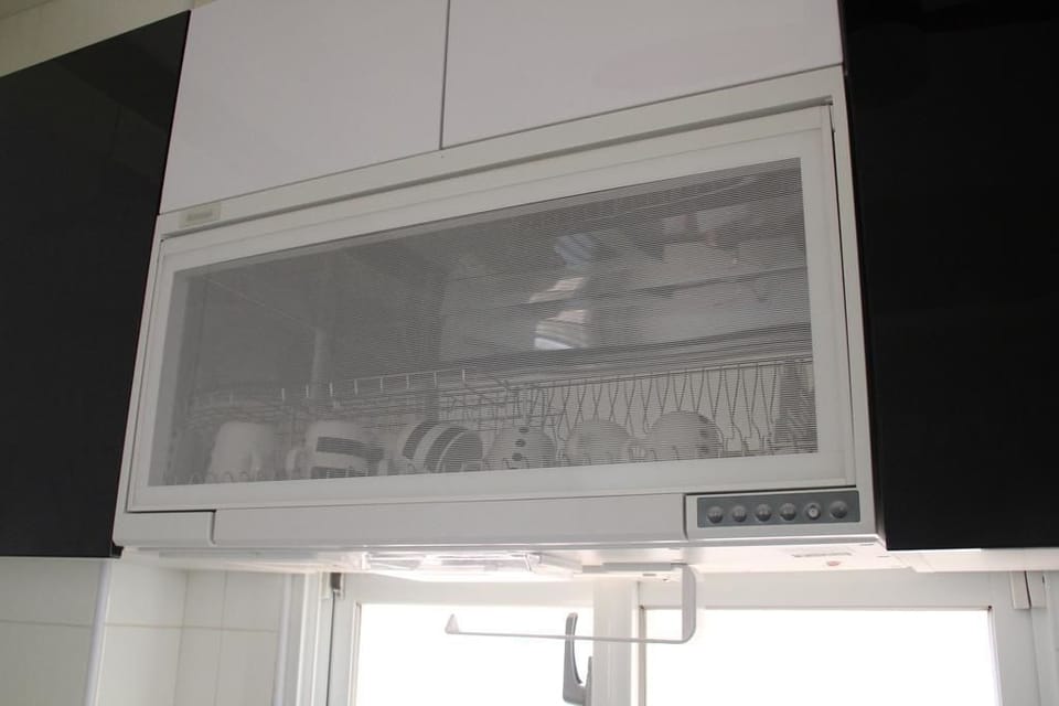 Fridge, stovetop, electric kettle, cookware/dishes/utensils
