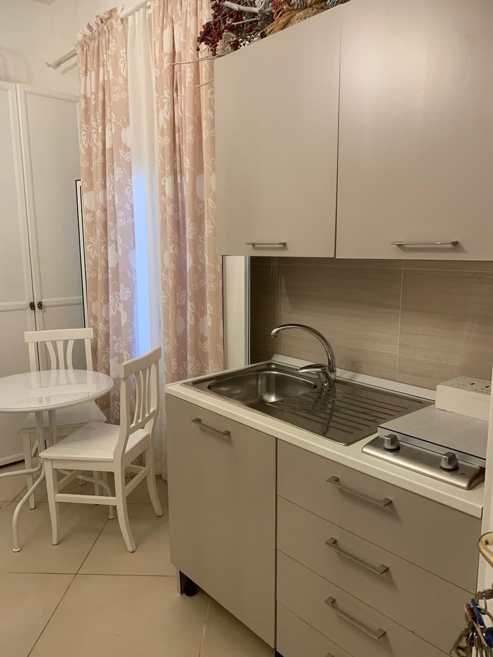 Economy Triple Room | Private kitchen | Shared fridge, electric kettle
