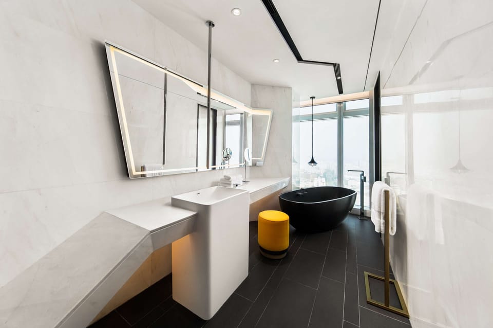 Separate tub and shower, free toiletries, hair dryer, bathrobes
